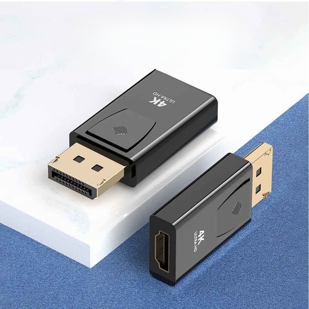Foto de adaptador DP a HDMI 4K Rayoshop: Conexión segura y estable.