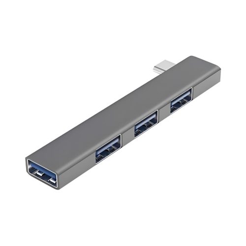 Un hub USB-C EON de aluminio gris muestra cuatro puertos USB laterales y un conector macho compacto para ampliar la conectividad del equipo.