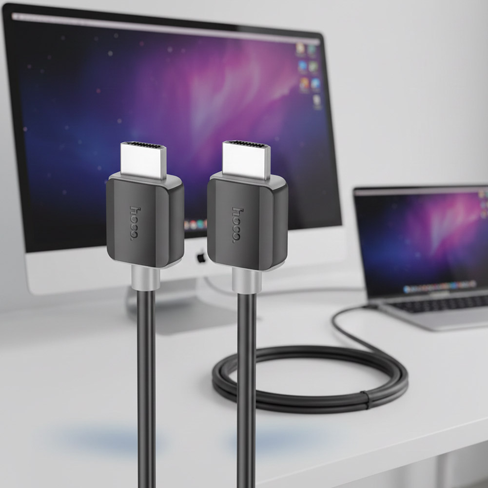 Cable HDMI Hoco negro de 3 metros con conectores HDMI 2.0, pensado para transmitir audio y video en 4K a 60 Hz con 18 Gbps.